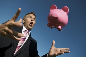 Businessman Piggy Bank Surprise