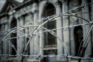 Razor Wire Restricts Access to A Derelict Building