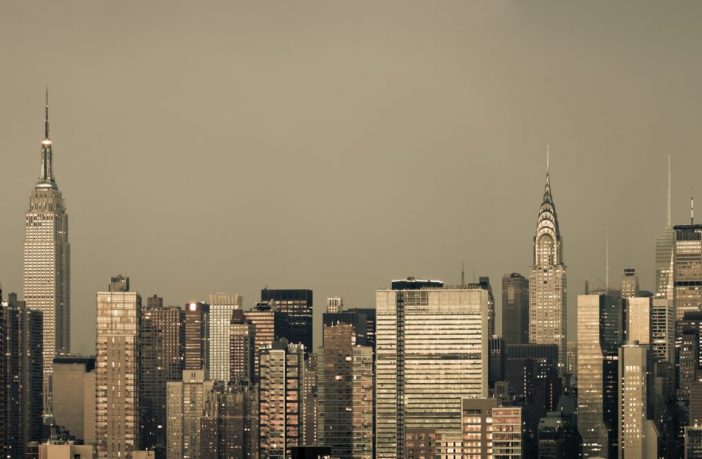 A monochromatic New York City skyline on a grungy morning