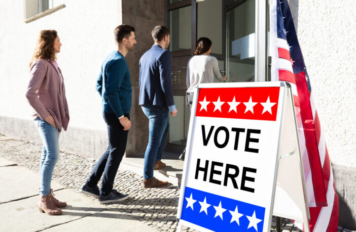 People Standing Outside Voting Room