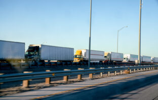 long line of trucks mexico